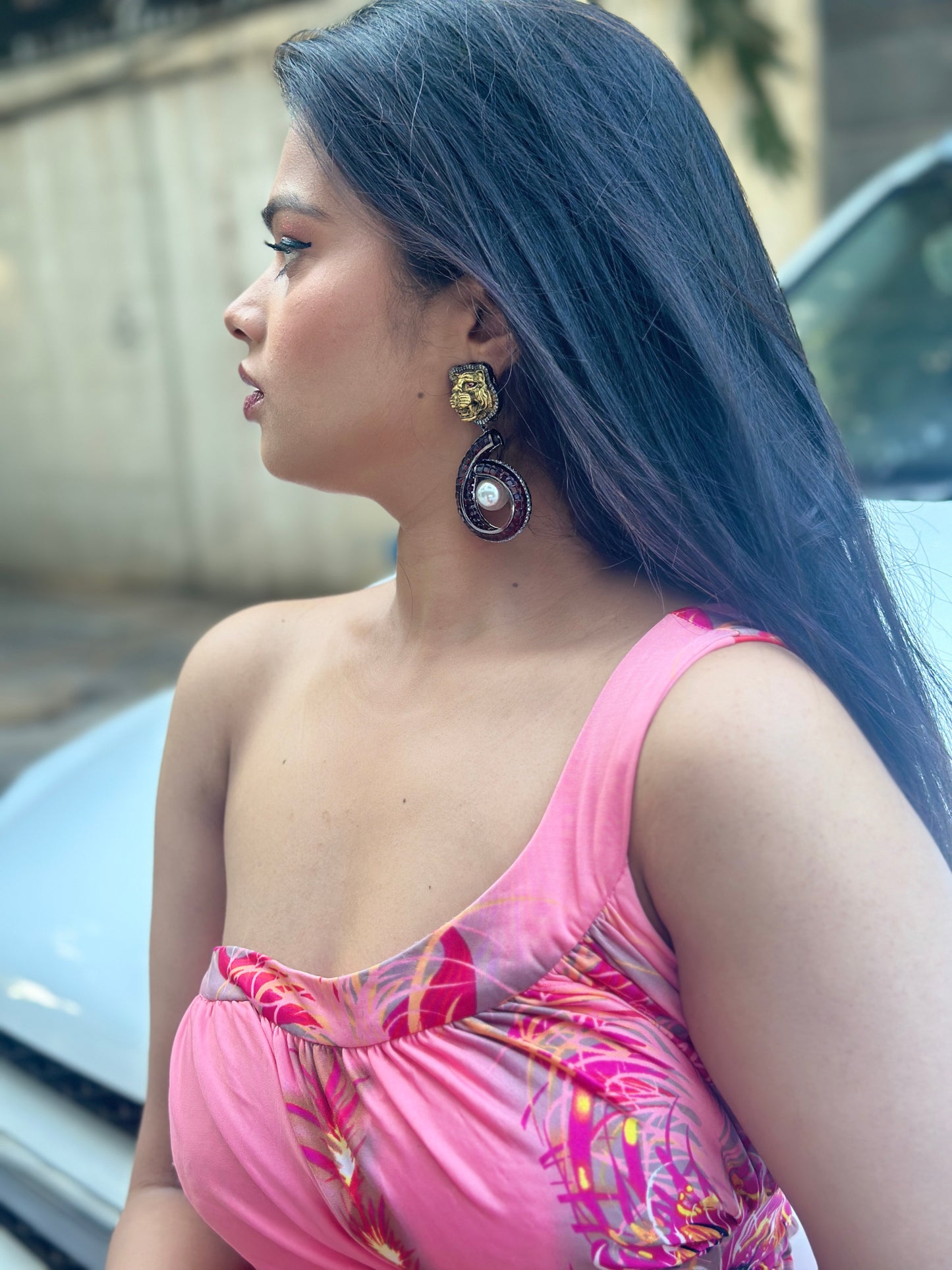 Lion faced pearl drop earrings