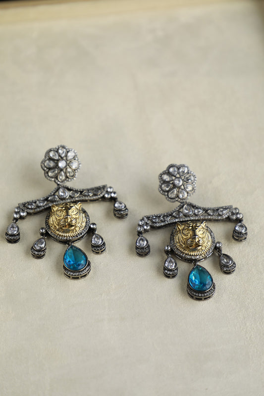 Golden Lion Faced Earrings With Crystal Blue Tear Drop