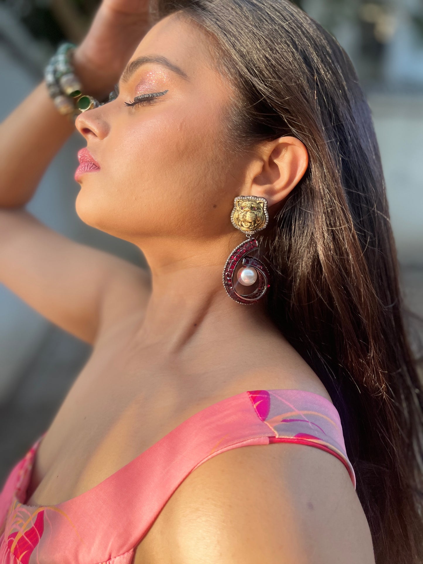 Lion faced pearl drop earrings
