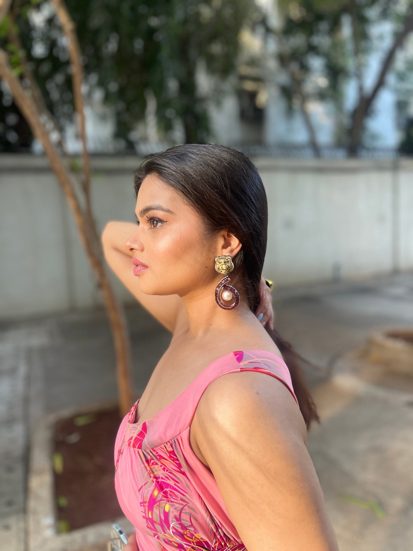 Lion faced pearl drop earrings